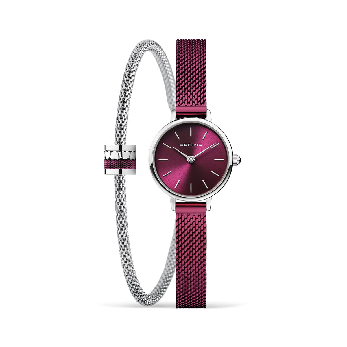 Zilveren horloge met paarse wijzerplaat en mesh-band, gecombineerd met een paarse armband.