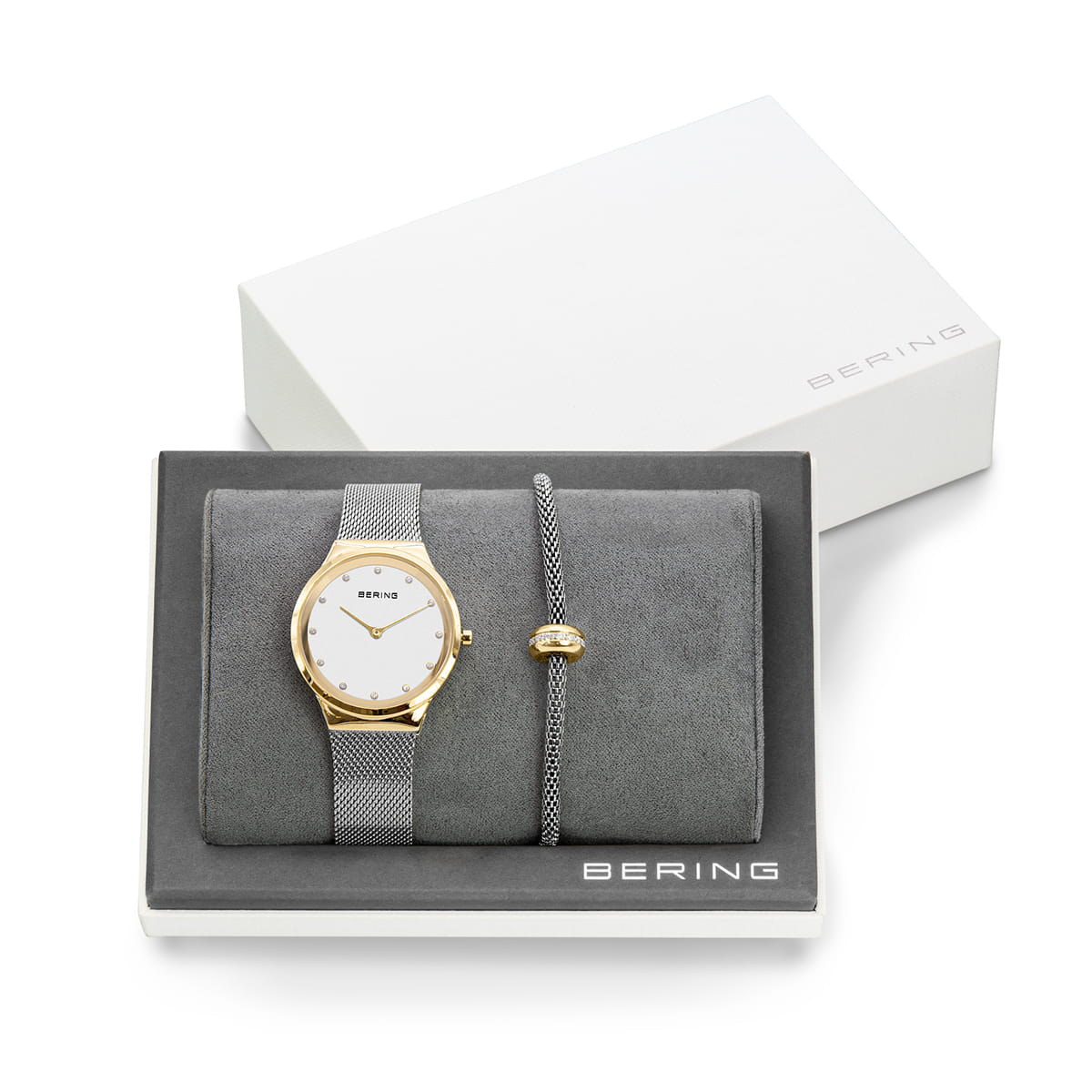 Gouden horloge met witte wijzerplaat en grijze band, geleverd in luxe geschenkdoos met bijpassende armband.