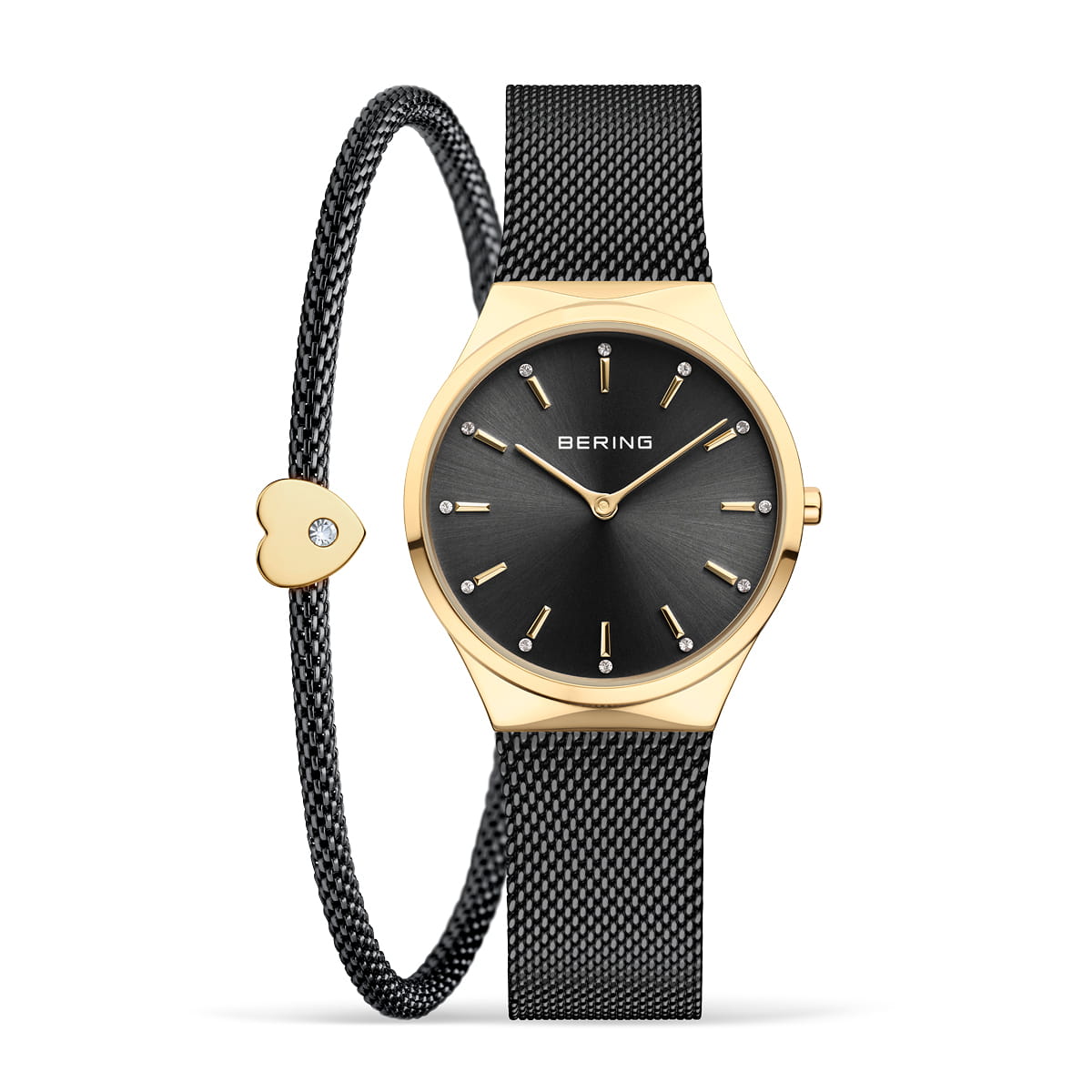 Dames horloge met zwarte wijzerplaat, gouden kast en mesh-band, inclusief armband met hartvormige sluiting.