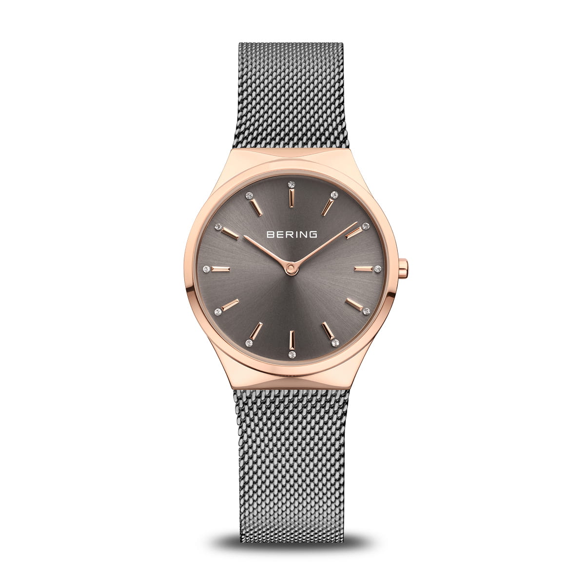 Ontdek de elegantie van Berings 12131-369-GWP horloge, met een strakke roestvrijstalen Milanese band en minimalistisch design. De ronde wijzerplaat heeft een quartz uurwerk, grijze wijzerplaat met gouden markeringen en wijzers, omhuld door een slanke roségouden lunette. De merknaam staat gecentreerd op de wijzerplaat.