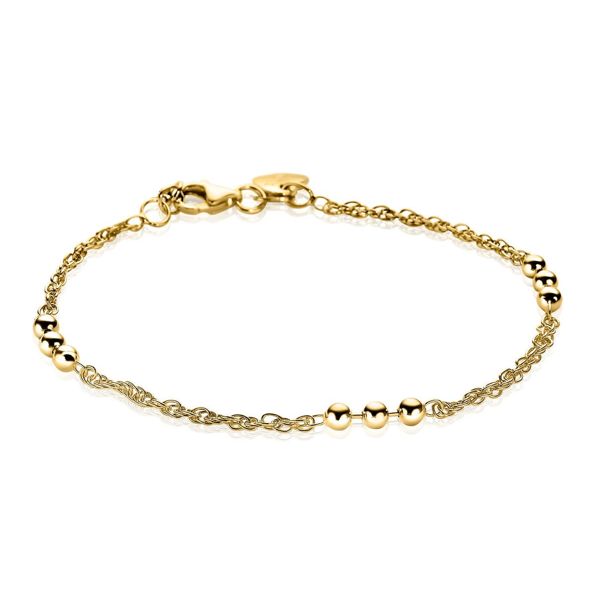 Gouden armband met een fijn schakelpand en bolletjesdetails.