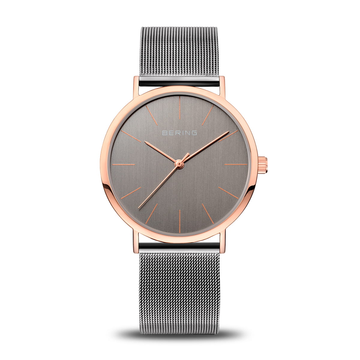 Roségouden horloge met een grijze wijzerplaat en een mesh-band.