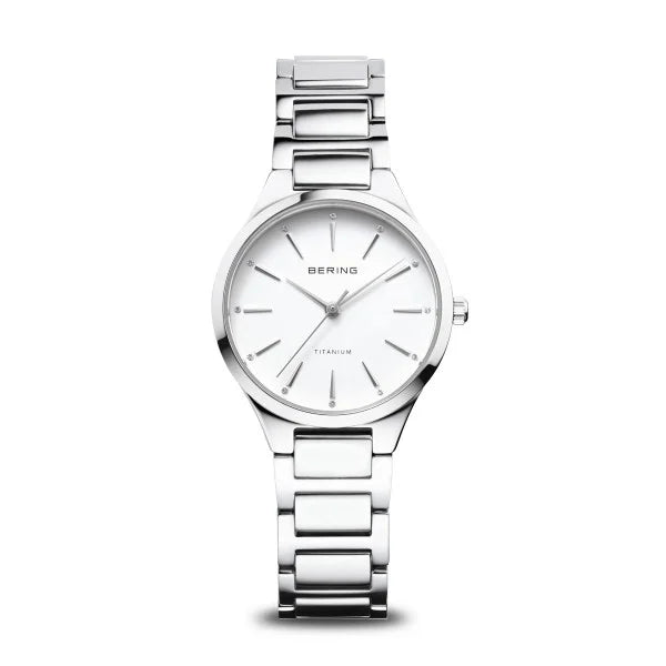 Zilveren horloge met een witte wijzerplaat en een schakelband.