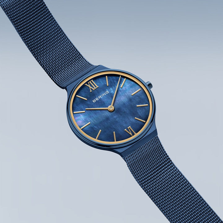 bering dames horloge blauwe wijzerplaat 18434-397