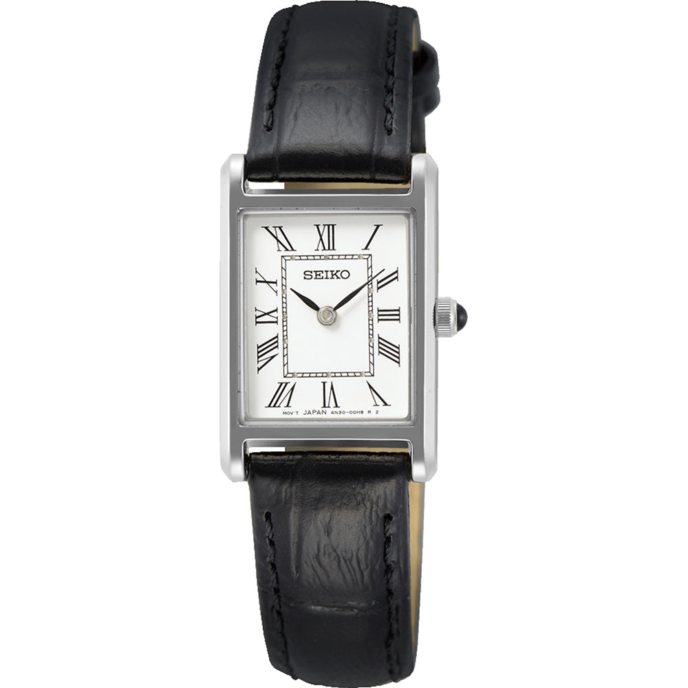Het Seiko dameshorloge SWR053P1 heeft een strak rechthoekig design, een zwarte leren band en een zilveren montuur. Het heeft een witte wijzerplaat met Romeinse cijfers en zwarte uur-/minutenwijzers, aangestuurd door quartz. Het merk Seiko wordt weergegeven onder de 12-uurspositie.
