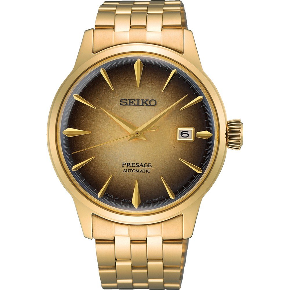 Heren horloge met gouden kast en armband, bruine wijzerplaat met gouden indexen en datumweergave.