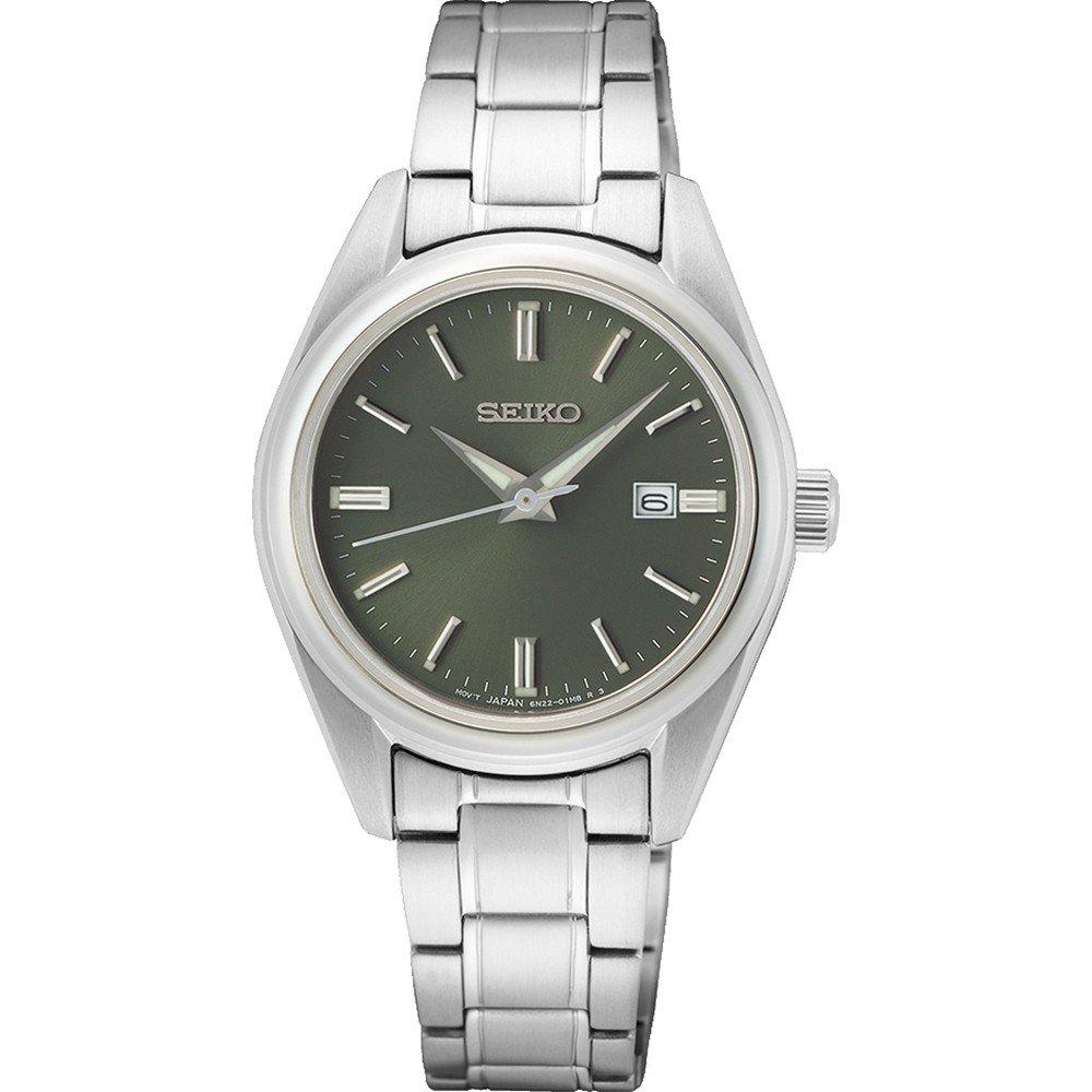 Zilveren dames horloge met groene wijzerplaat en een metalen schakelband.