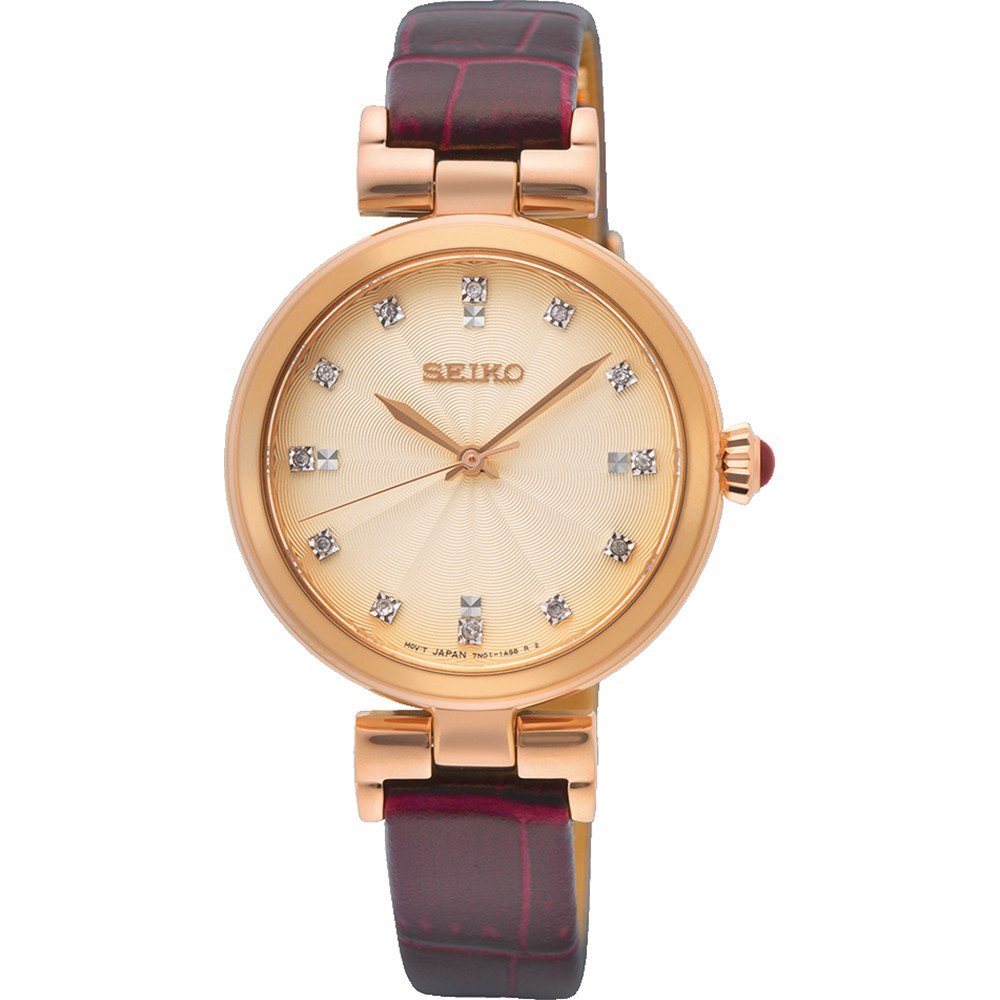 Roze gouden dames horloge met een crème wijzerplaat en een bordeaux leren band, versierd met steentjes.