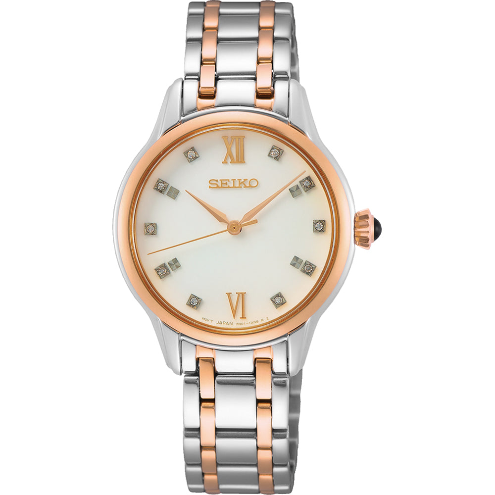 Zilveren dames horloge met roségouden bezel, witte wijzerplaat en diamantvormige indexen.
