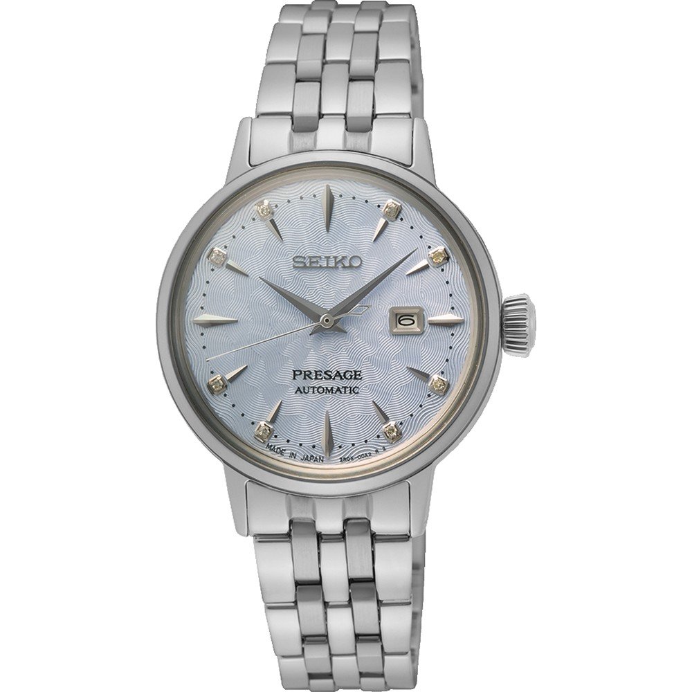 Zilveren dames horloge met een lichtblauwe wijzerplaat, gouden indexen en een schakelband.