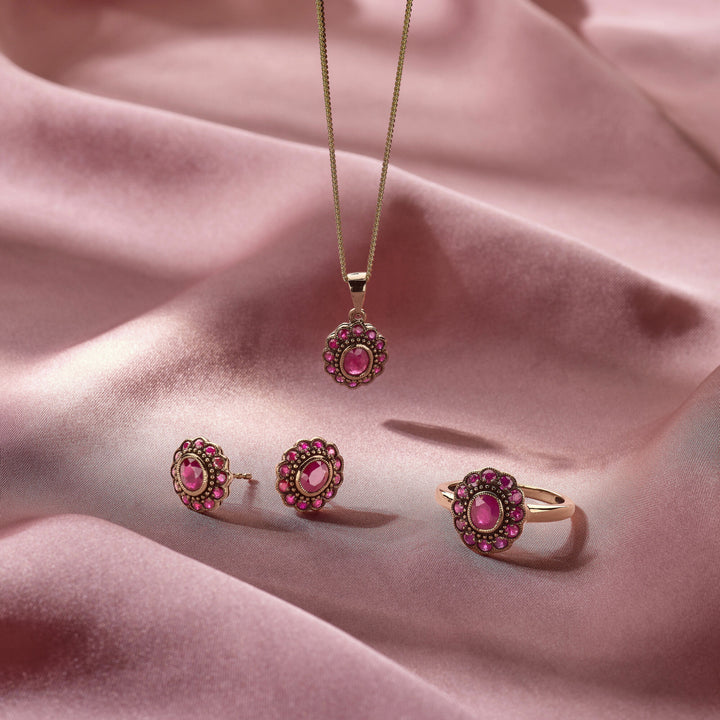 oorknoppen robijn 14K geelgoud