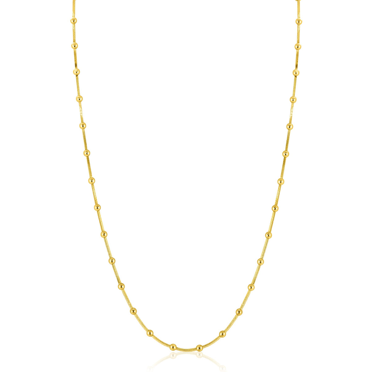 Gouden ketting met bolvormige details en een verfijnde schakelstructuur.