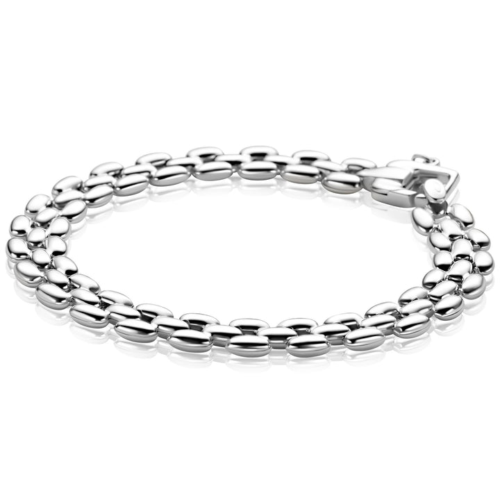 De Zinzi armband zilver ZIA2764 van Zinzi heeft twee rijen gepolijste ovale schakels en een rechthoekige sluiting. Deze armband biedt klassieke elegantie en een op Rolex geïnspireerde stijl in zilver tegen een witte achtergrond.