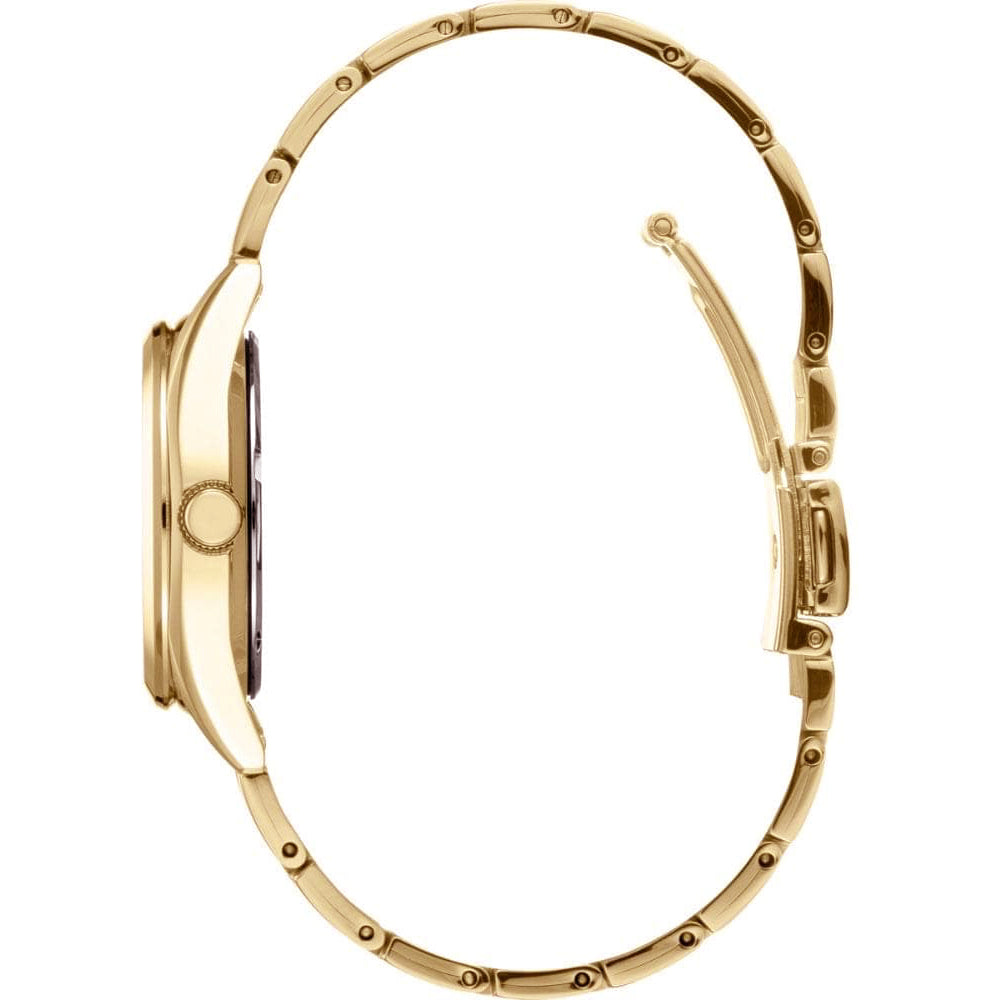 Zijaanzicht van het gestroomlijnde Seiko dameshorloge SUR632P1 met een slanke metalen band, die de dunheid en sluiting benadrukt. Dit gouden horloge is voorzien van saffierglas en is waterdicht tot 10 ATM, wat de elegantie verbetert en de nadruk legt op het verfijnde ontwerp door de wijzerplaat uit het zicht te houden.