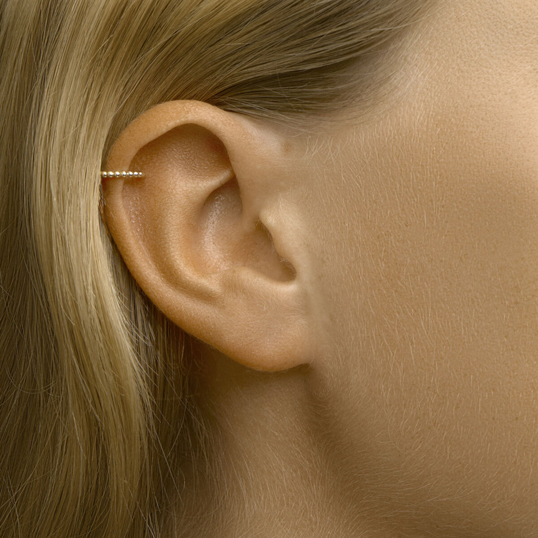 earcuff bolletjes per stuk 14K geelgoud