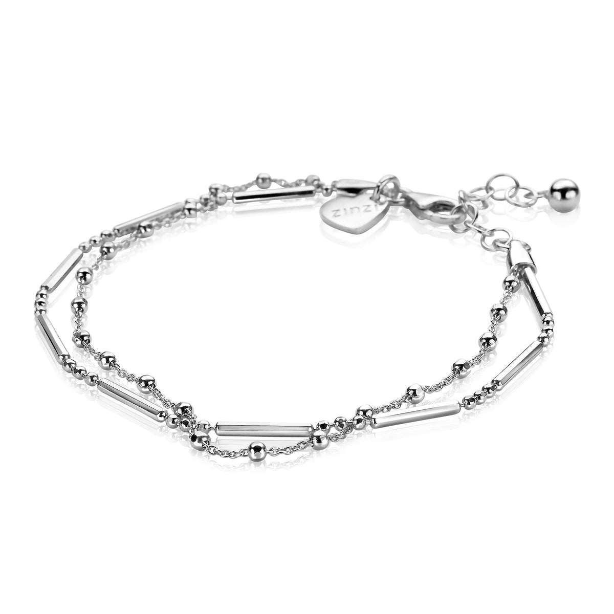 Zilveren armband met een combinatie van bolletjes en rechte staafjes, voorzien van een verlengketting en sluiting.