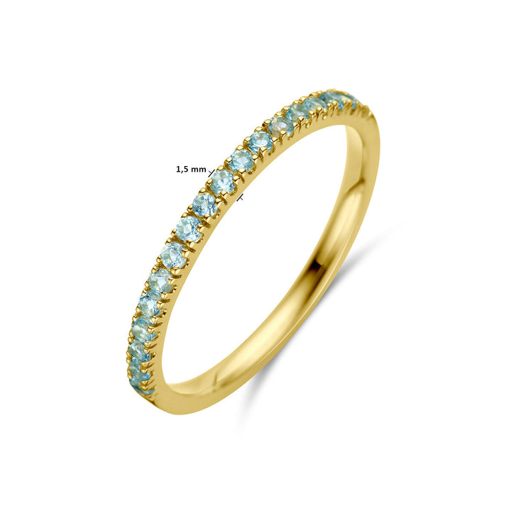 ring with birthstone blue topaz December 14K yellow gold