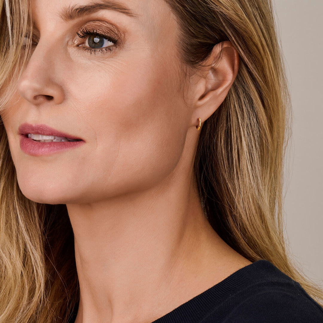 klapoorringen 12.5 mm 14K geelgoud