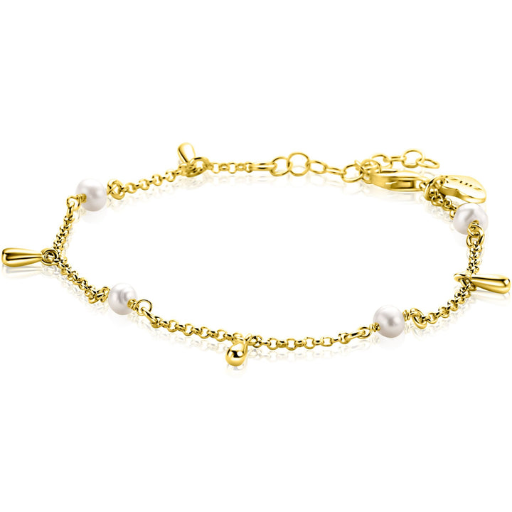 De Zinzi Armband Gold Plated ZIA2753 van Zinzi heeft kleine zoetwaterparels en gouden druppelbedels aan een fijne ketting, afgewerkt met een karabijnsluiting.