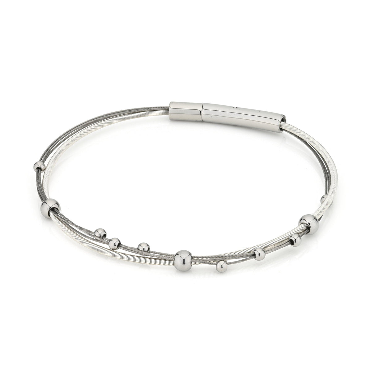 Zilveren armband met speelse bolletjes in verschillende groottes op een gladde band.