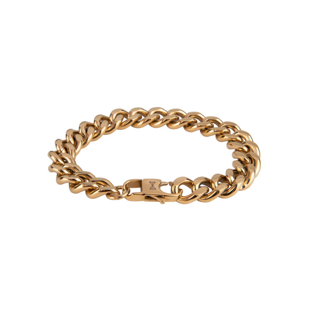 Gouden gourmette armband met een volle platte schakel en een stevige sluiting.