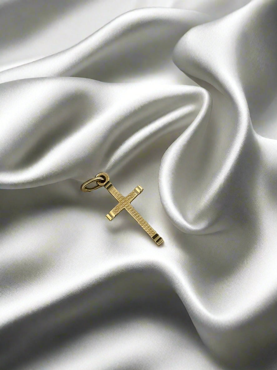Vintage gouden hanger in de vorm van een kruis, 14k, met een glanzende afwerking.