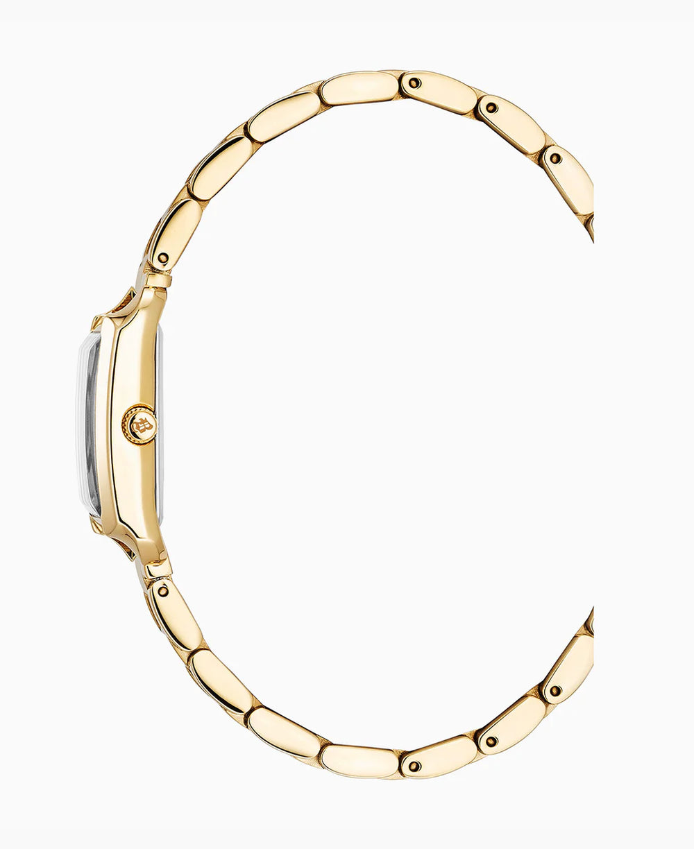 Zijaanzicht van het Jacques Du Manoir Emily gouden dameshorloge, met een slank profiel met zichtbare kroon en geschakelde armband, tegen een witte achtergrond.