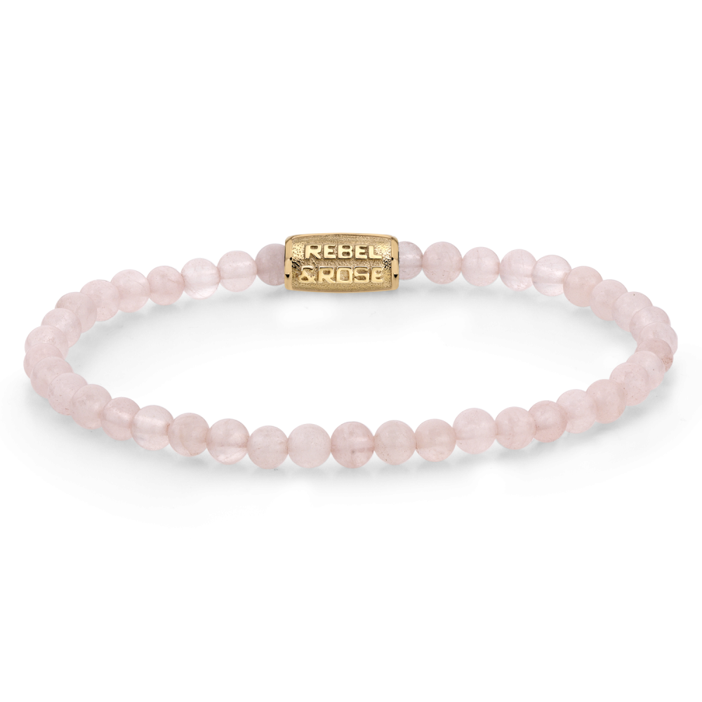Roze gouden kralenarmband van 4 mm met een gouden sluiting en een 'REBEL'-inscriptie.
