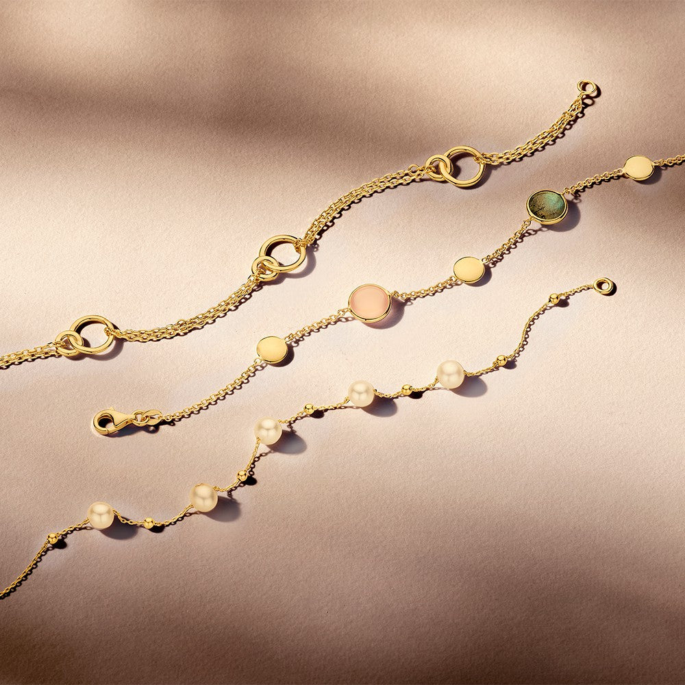 Geelgouden Armband met Dubbele Rij en Verbonden Cirkel Elementen – 14-Karaat Luxe voor Dames