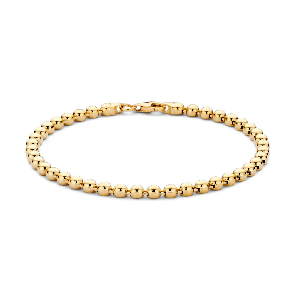 Geelgouden armband met een rij gouden bolletjes, soepel van ontwerp en eenvoudig in stijl.