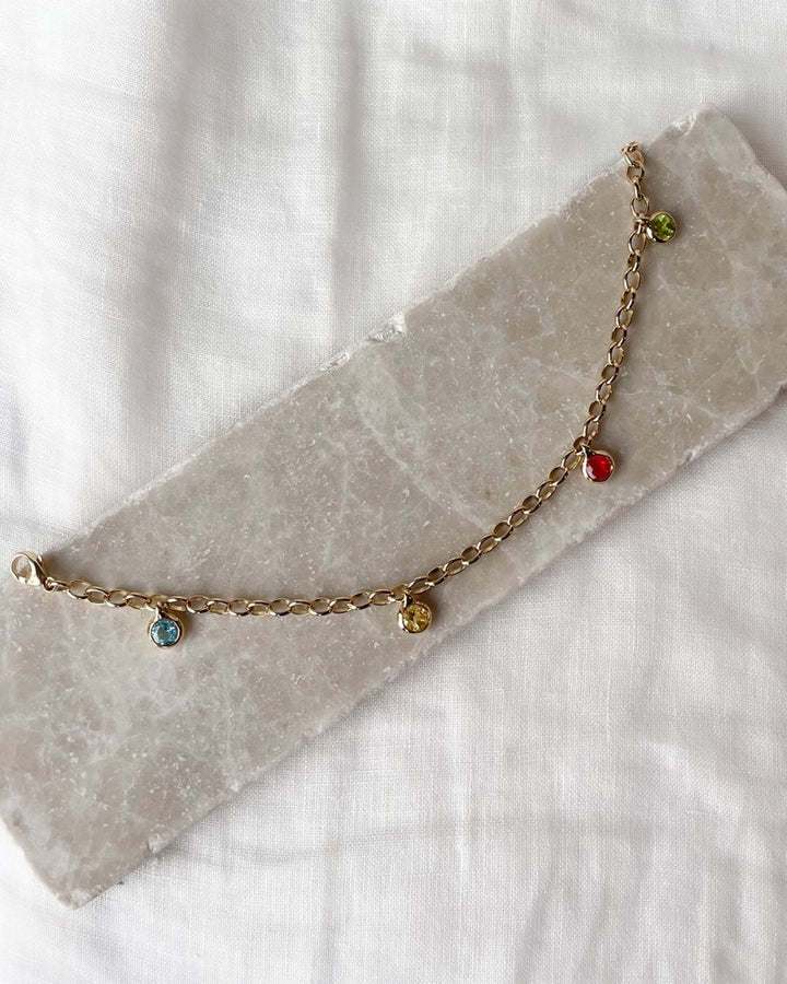 Geelgouden Armband met Edelstenen Bedels – 14-Karaat Goud – Blauwe Topaas, Peridot, Lemon Kwarts & Vuuropaal