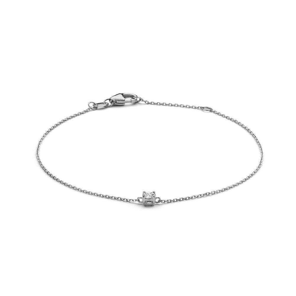Witgouden armband met een fijne schakel en een centrale diamant van 0,15 crt.