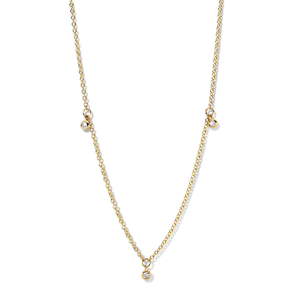 Geelgouden collier met drie kleine diamanten, fijne schakelketting en een tijdloze uitstraling.