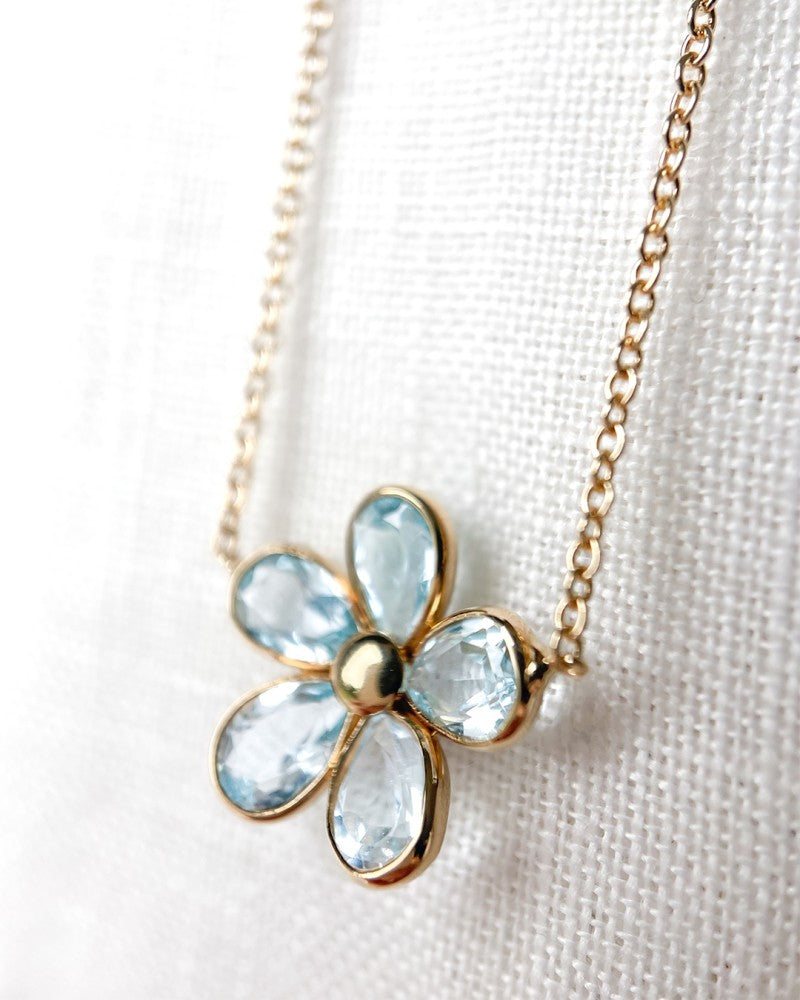 Geelgouden Collier met Speelse Bloemhanger & Blauwe Topaas – 14 Karaat Goud