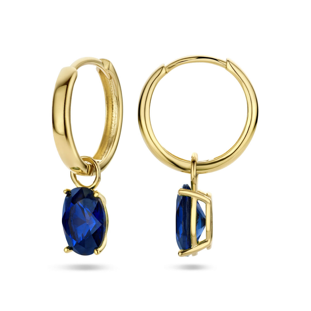 klapoorringen blauw zirkonia 14K geelgoud