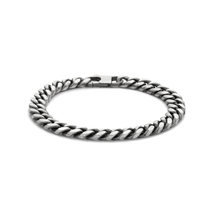 De Van der Kooij Collectie armband oxi gourmette 6-zijdes geslepen, 8,5 mm breed in geoxideerd zilver, met robuuste schakels en een eenvoudige sluiting, gepresenteerd in cirkelvorm op een witte achtergrond.