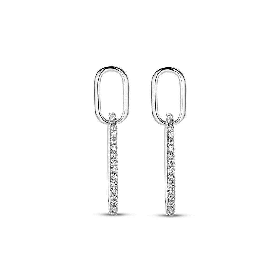 Van der Kooij Collectie oorhangers zirkonia 24 mm zilver gerhodineerd: ovalen schakels met hangende hoepels, bezet met fonkelende witte steentjes, getoond op een witte achtergrond.