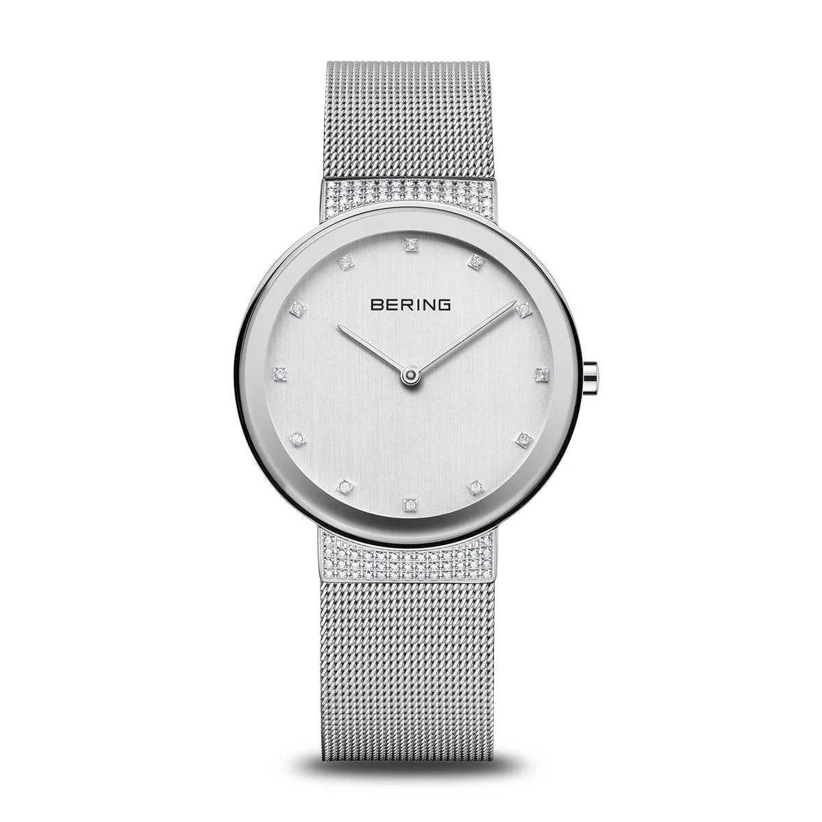 Zilveren dameshorloge met een mesh-band en een strakke, minimalistische wijzerplaat met steentjes.