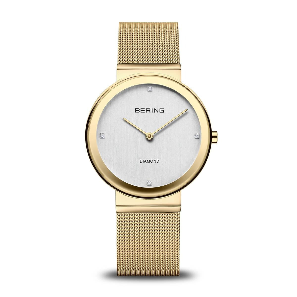 Gouden dameshorloge met een zilveren wijzerplaat en een mesh-band.