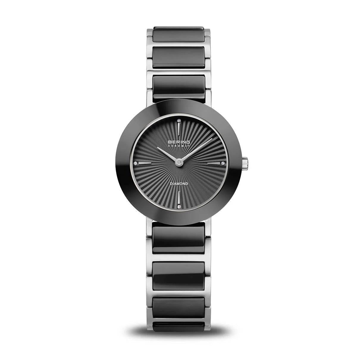 De Bering dames horloge zwarte wijzerplaat - 11429-702 heeft een ronde zwart met zilveren kast, een zwart/zilveren keramische band, grijze sunburst wijzerplaat met zilveren markers en wijzers, en duurzaam saffierglas. Merk: Bering.