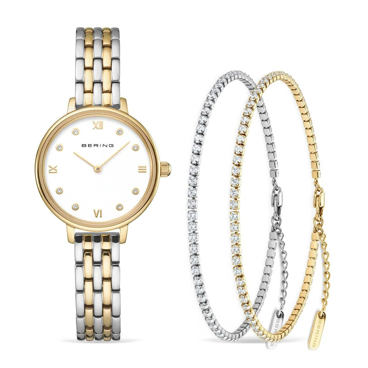 Gouden en zilveren Bering dames horloge met witte wijzerplaat en Romeinse cijfers, inclusief twee bijpassende armbanden.