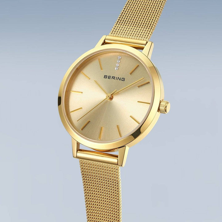 bering dames horloge goudkleurige wijzerplaat 13434-333