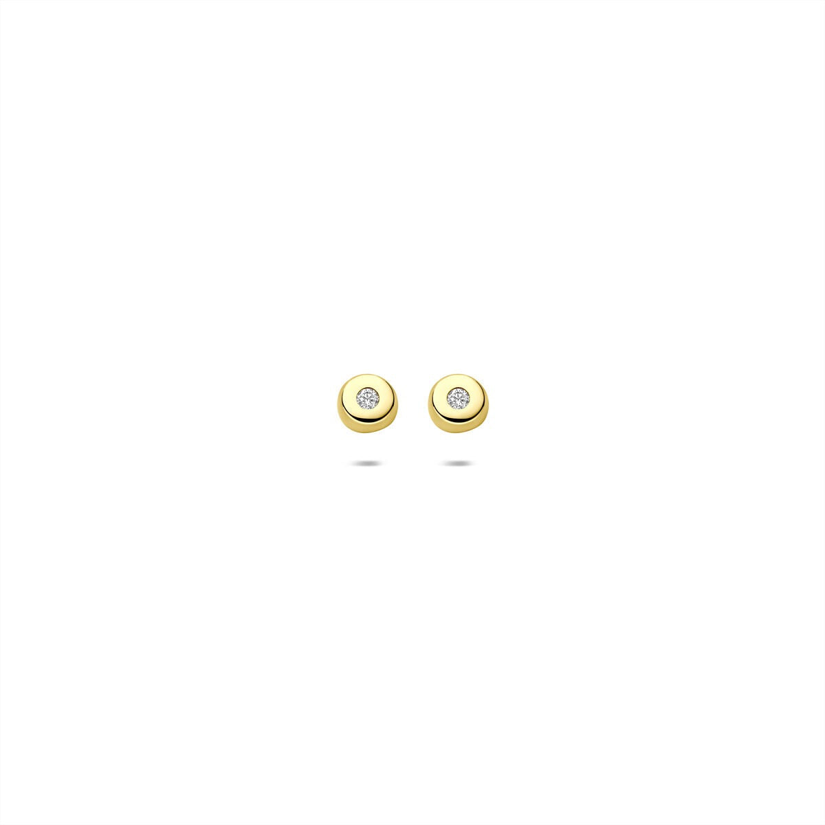 Gele oorknopjes van 9k goud met een zirkonia in een zetkast.