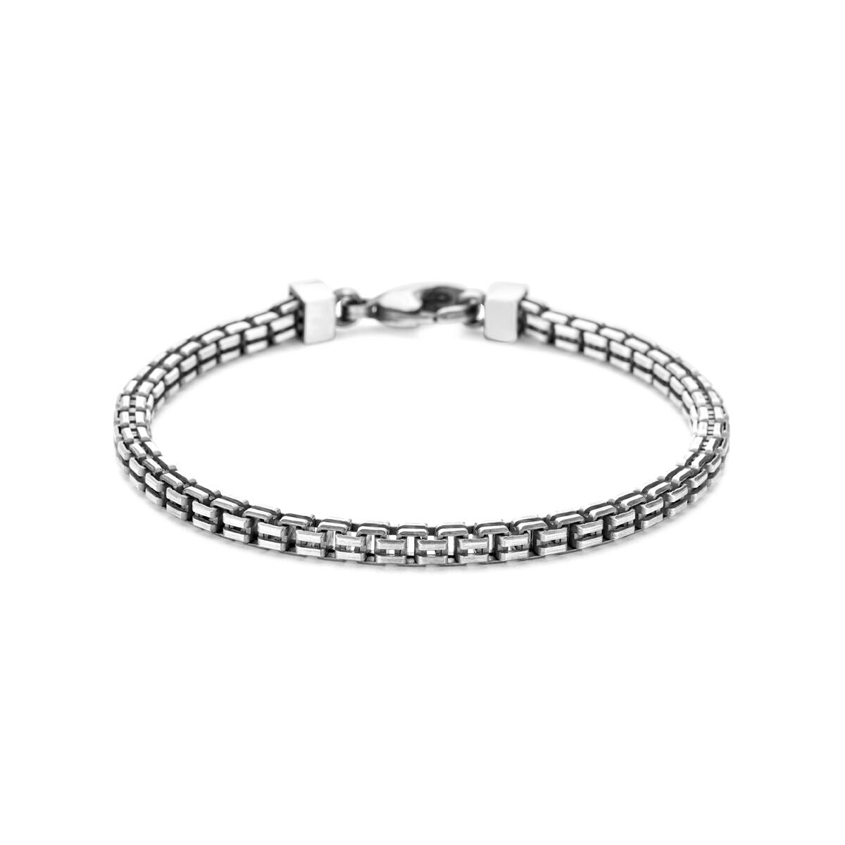 Geoxideerde zilveren heren armband met een fantasie schakel en een stevige sluiting.