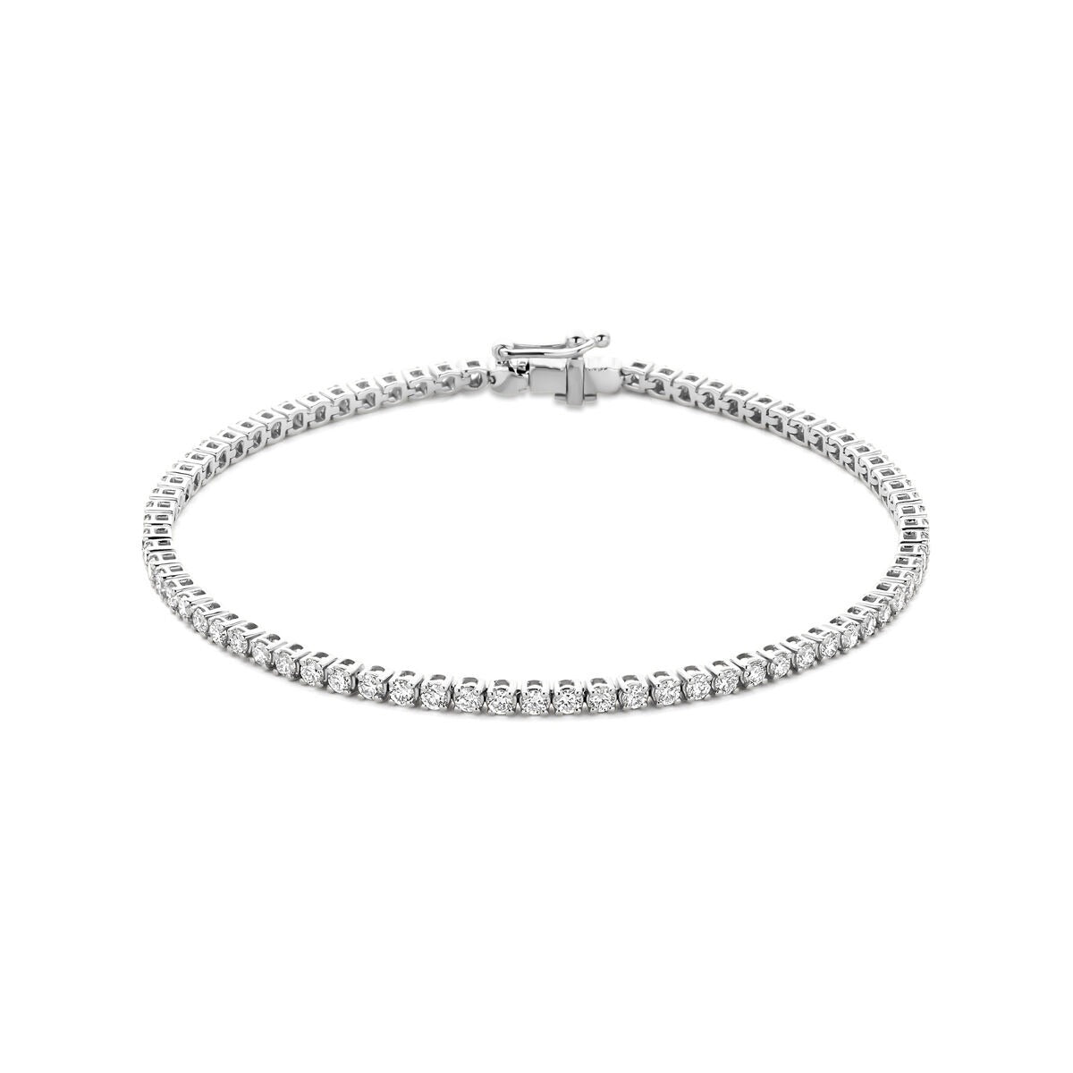Witgouden tennis armband met lab grown diamanten, voorzien van een sluiting en een strakke schakelstructuur.