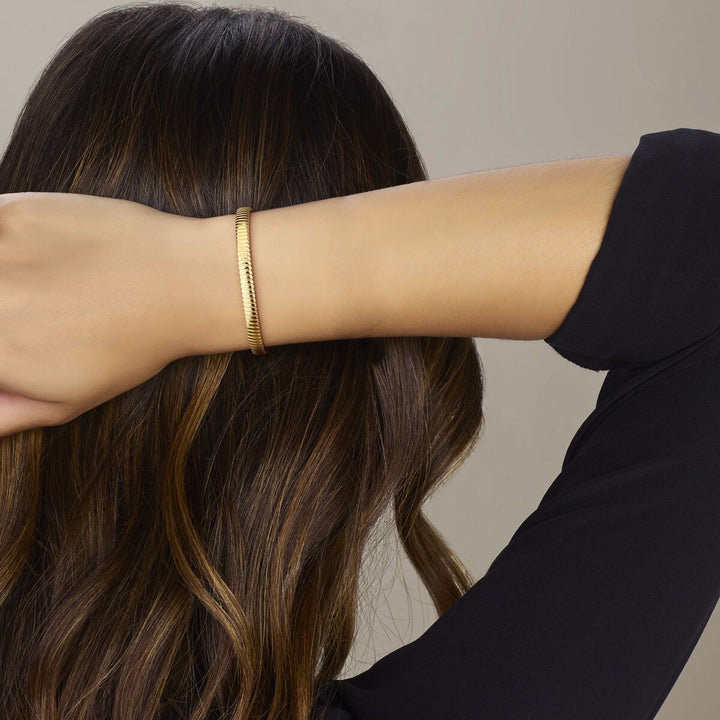 14k Geelgouden dames armband met tubogas schakel – 6 mm