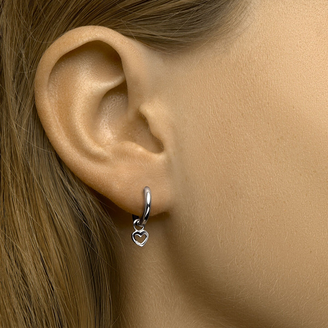 Zilveren kinder oorringen met hartjes hanger