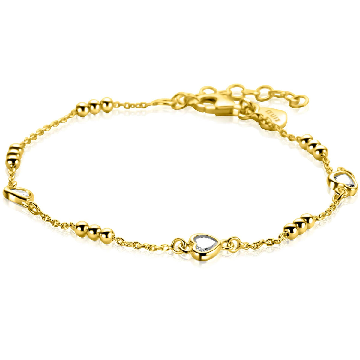 Gouden armband met hartvormige en bolvormige elementen, afgewerkt met een sluiting.