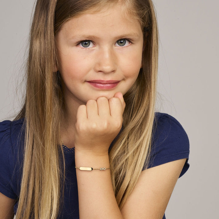 Gouden Graveerarmband 14k met Infinity en Zirkonia – Kinder Armband