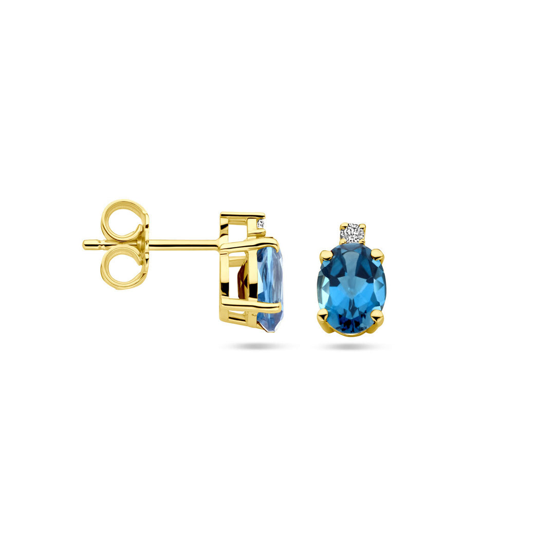 ear studs london blue topaz and diamond 0.04ct (2x 0.02ct) h si 14K yellow gold